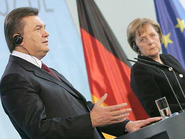Меркель хочет переговоров с Януковичем и грозит санкциями